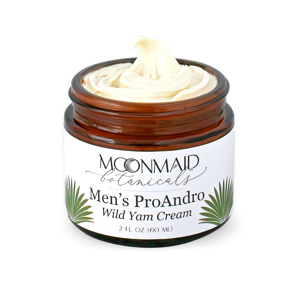 An open jar of Moonmaid Botanicals Men's ProAndro Wild Yam Cream showing a close-up swirl of the smooth, off-white thick cream texture.