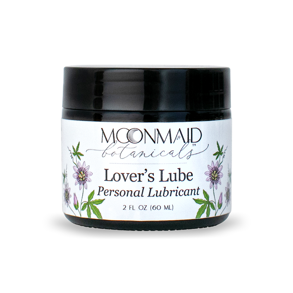 A closed 2 fl oz jar of Moonmaid Botanicals Lover's Lube Personal Lubricant decorated with purple passionflower illustrations.
