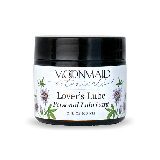 A closed 2 fl oz jar of Moonmaid Botanicals Lover's Lube Personal Lubricant decorated with purple passionflower illustrations.
