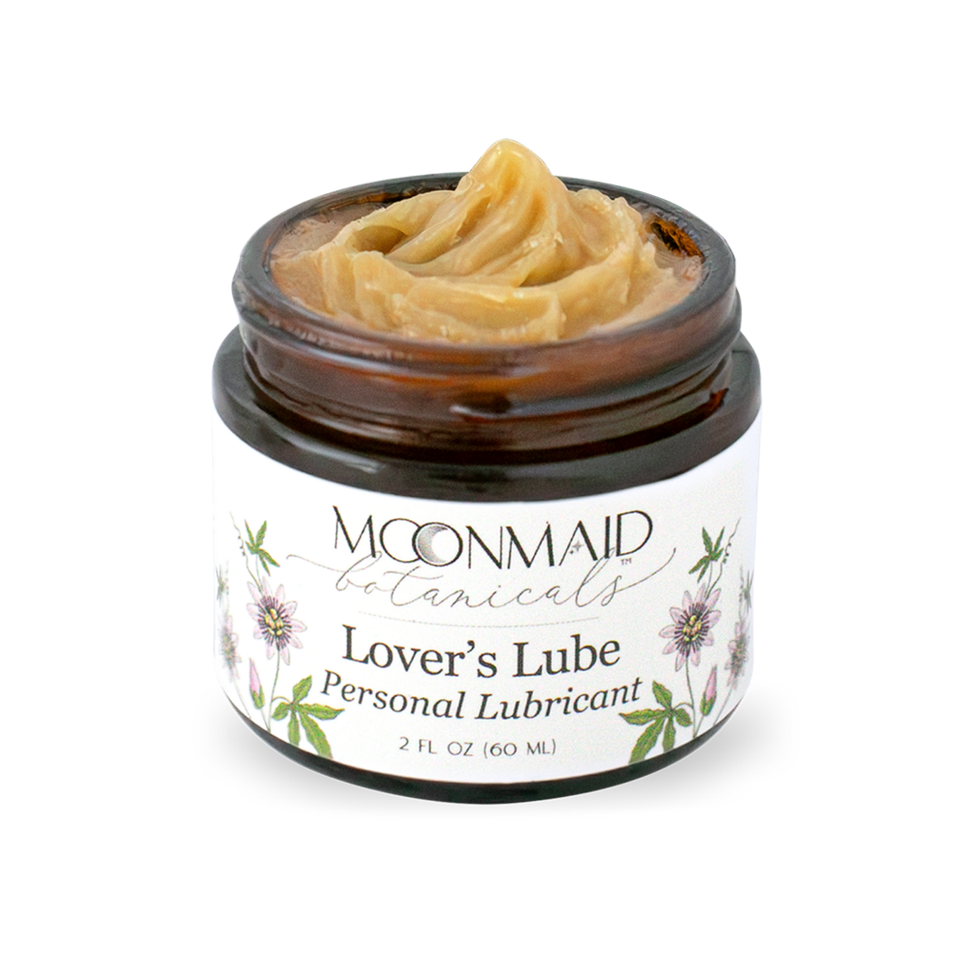 An open amber glass jar of MoonMaid Botanicals Lover's Lube Personal Lubricant, showing a thick, swirled peak of tan-colored ointment inside.