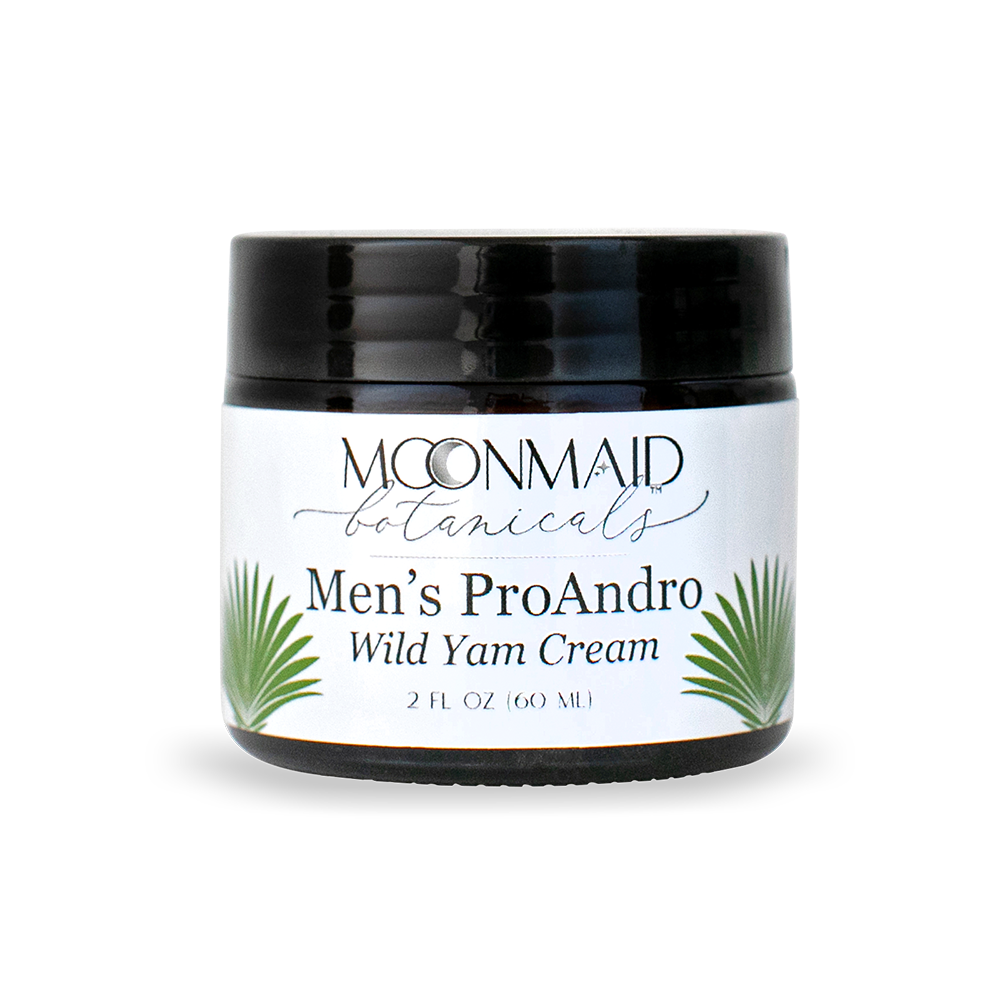 A closed 2 fl oz amber glass jar of Moonmaid Botanicals Men's ProAndro Wild Yam Cream featuring green saw palmetto leaf illustrations.