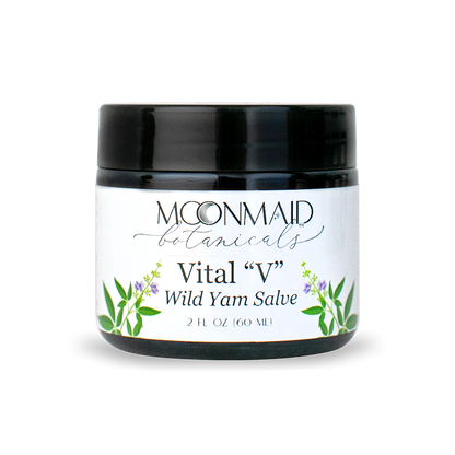 A closed 2 fl oz dark amber glass jar of Moonmaid Botanicals Vital V Wild Yam Salve featuring purple chaste tree berry flower illustrations.
